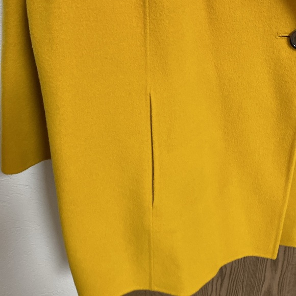 A woman’s mustard, yellow wool coat. - Picture 5 of 6